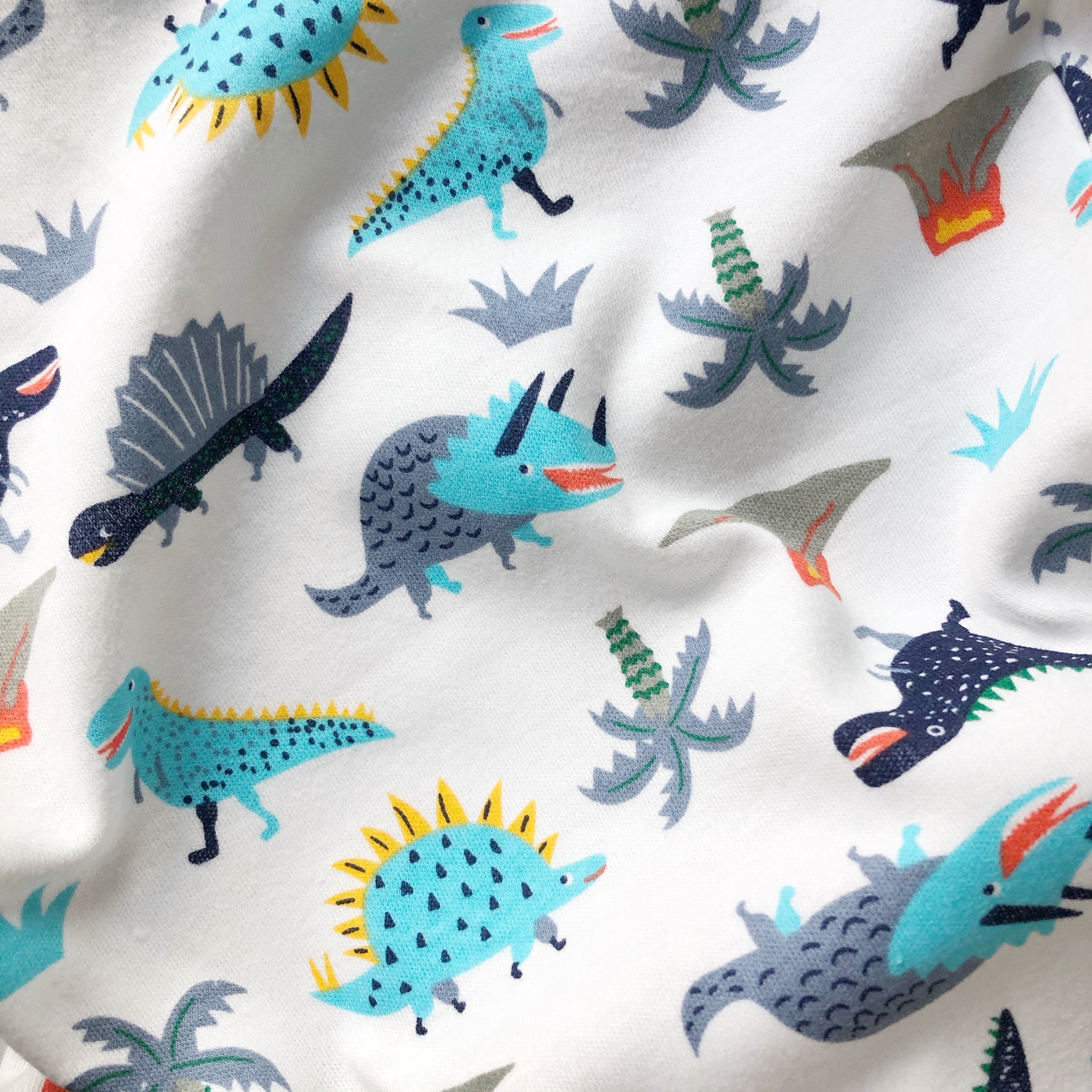 White Dinosuar Print Zipped Babygrow