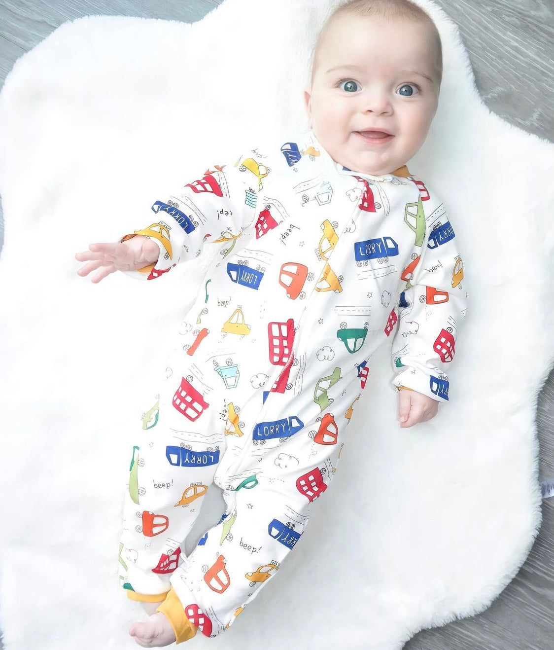 Cars And Buses Print Zipped Footless Babygrow