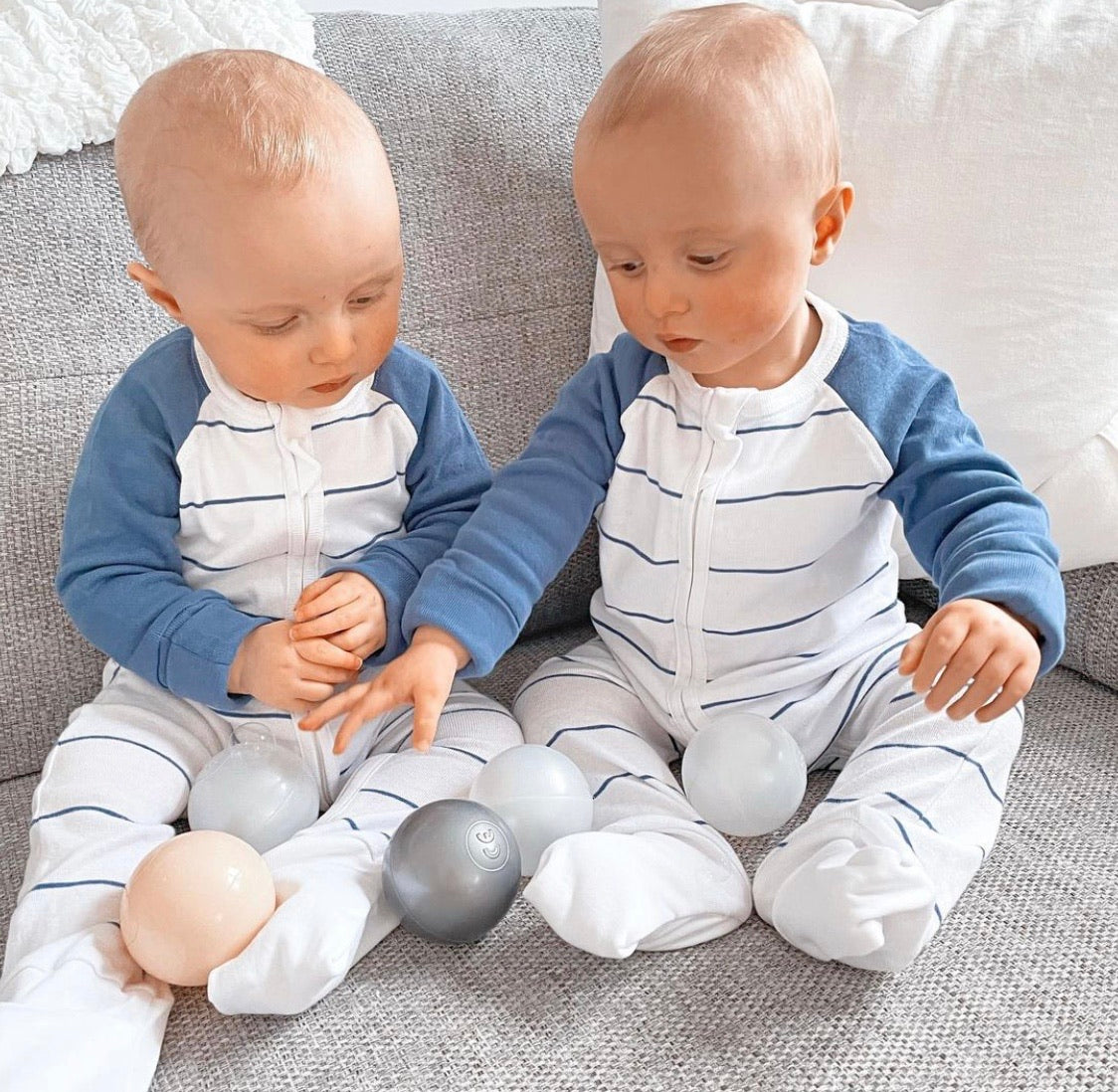 white and denim striped zip up babygrow