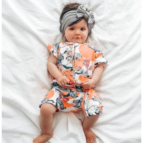 Tropical Floral Print Short Sleeved Zip Up Babygrow