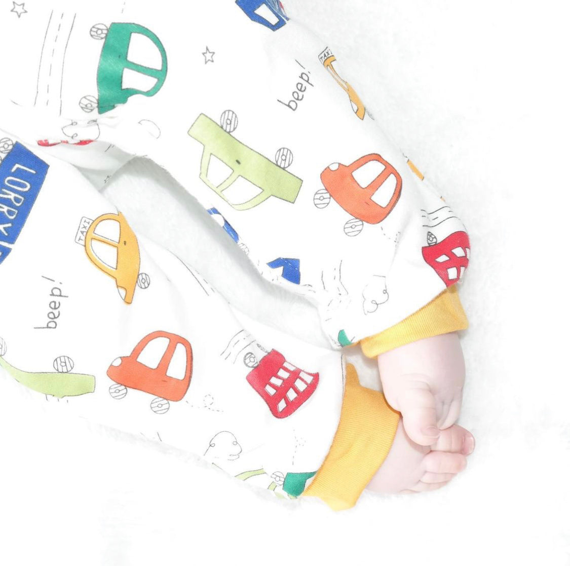 Cars And Buses Print Zipped Footless Babygrow
